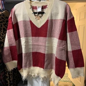 Distressed plaid sweater